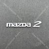 ABS Car Logo Front Grille Rear Trunk Steering Wheel Decoration Sticker For MAZDA2 2009- 2011-2015 16 17-2025 2026 MAZDA2 Emblem BBF3