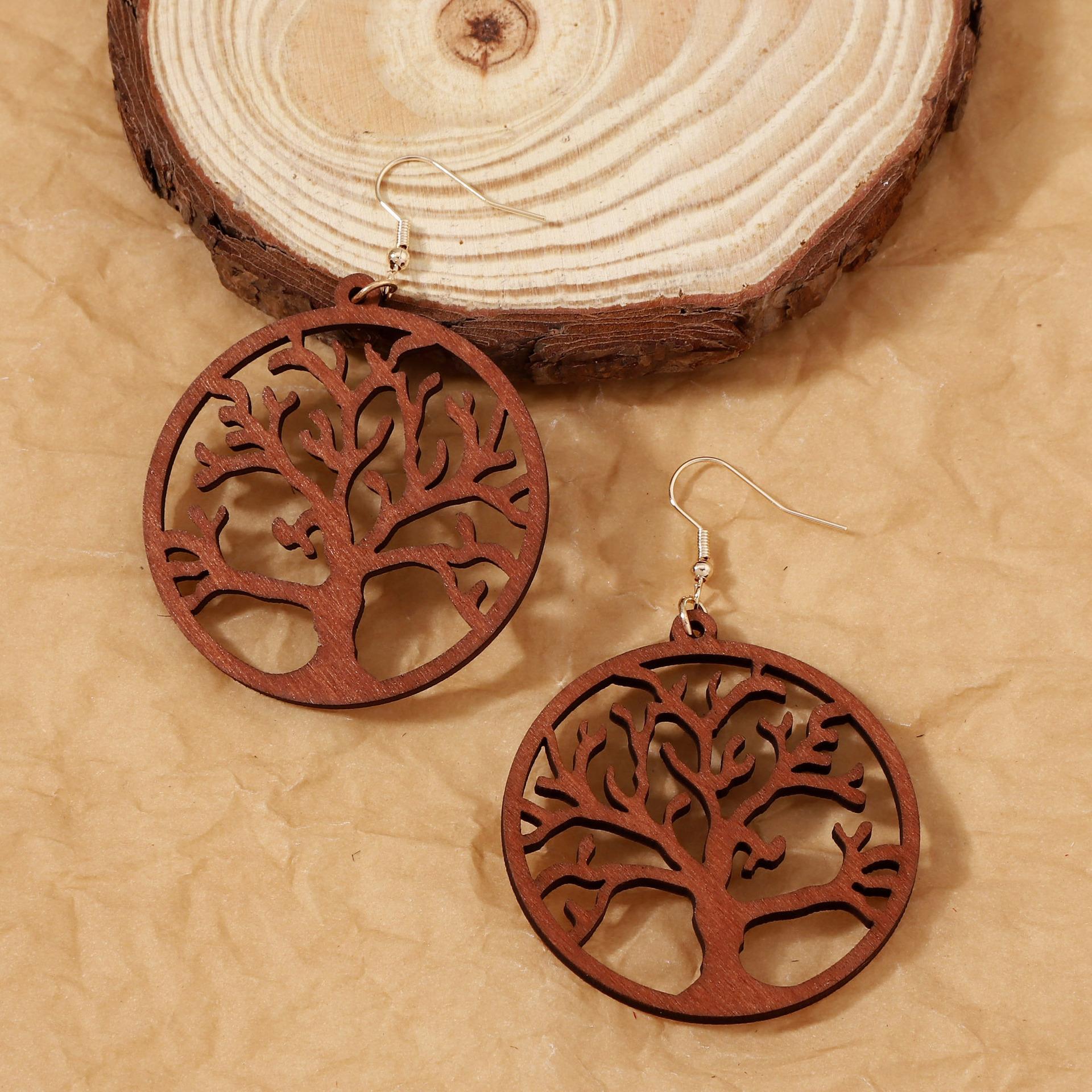 

Wooden laser-cut hollowed-out earrings with a unique and distinctive design sense - the Tree of Life earrings