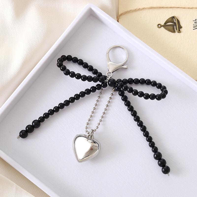 Creative Pearl Bow Pendant Keychain: Exquisite Gift Accessory for Bag or Phone Case