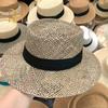 Travel Natural seagrass hollow flat brim hat ladies summer porkpie concave round sun hat beach straw hat with ribbon sale