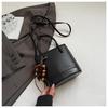 Niche High-End Women's French Luxury Woven Shoulder and Crossbody Bucket Handbag