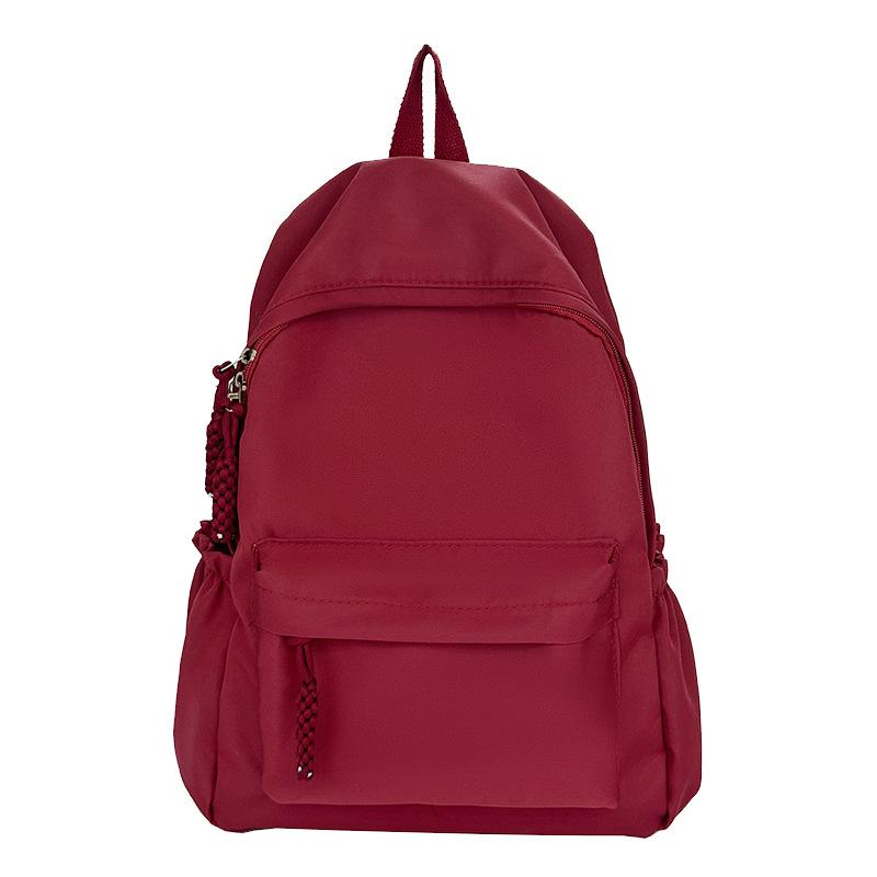 Schoolbag Korean version student schoolbag simple and fashionable large-capacity backpack high value small fresh campus backpack wholesale