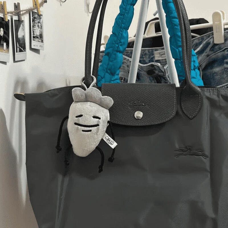 A trivial gray carrot doll keychain test bag hook key holder
