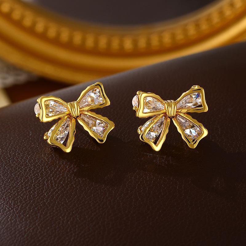 Elegant Gold-Plated Zirconia Bow Stud Earrings - High-End Fashionable Design for Women