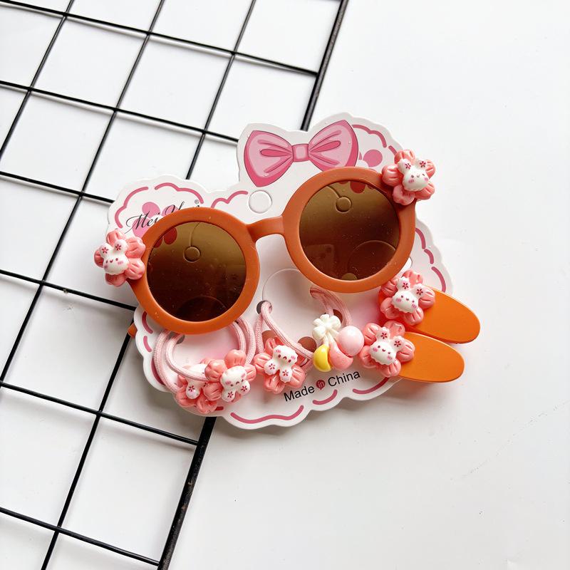 

Детские солнцезащитные очки с мультяшным принтом и заколками для волос, комплект солнцезащитных очков для мальчиков и девочек, модные аксессуары для отдыха на открытом воздухе, новые линзы переменного тока, оправа из поликарбоната, безопасная для детей кр