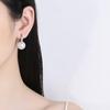 Boucles d'oreilles rétro françaises en forme de U avec perles pour femmes: Haut de gamme, style élégant pour l'automne et l'hiver.