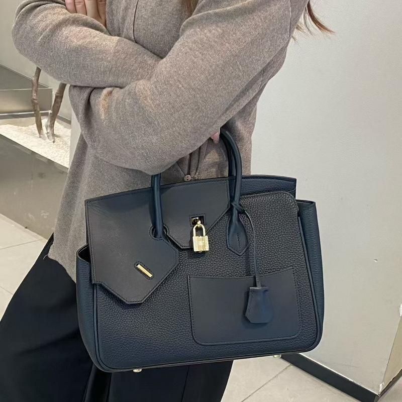 New genuine leather women's bag top layer cowhide 30CM irregular diagonal hijab Desordre handbag