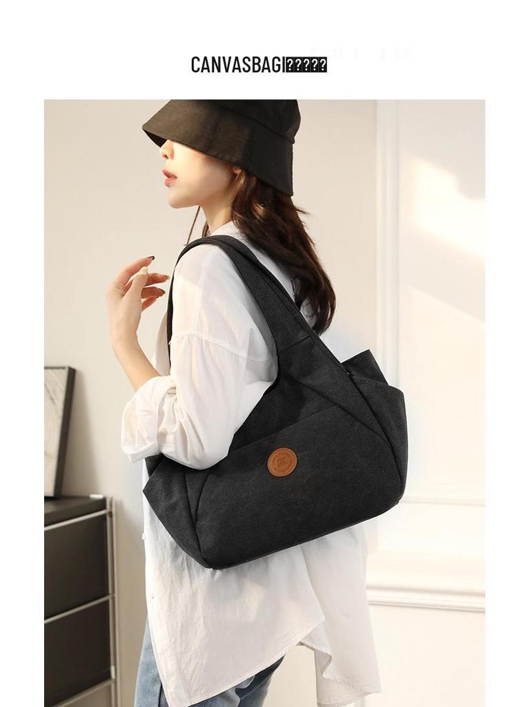 2025 Women's One-Shoulder Bag: Trendy, Versatile Canvas Handbag with Large Capacity, Simple Korean Style, Solid Color.