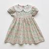 Hand-Knitted Smocked Floral Doll Collar Short-Sleeve Girls' Dress - Summer 2026 French Korean Chic Style