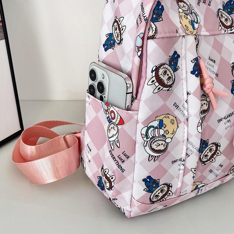 School bag children's 2024 new primary school backpack cartoon cute printing lightweight burden reduction backpack tide