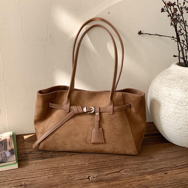 Korean version of niche bag women's 2025 winter new retro shoulder armpit bag large capacity commuter tote bag