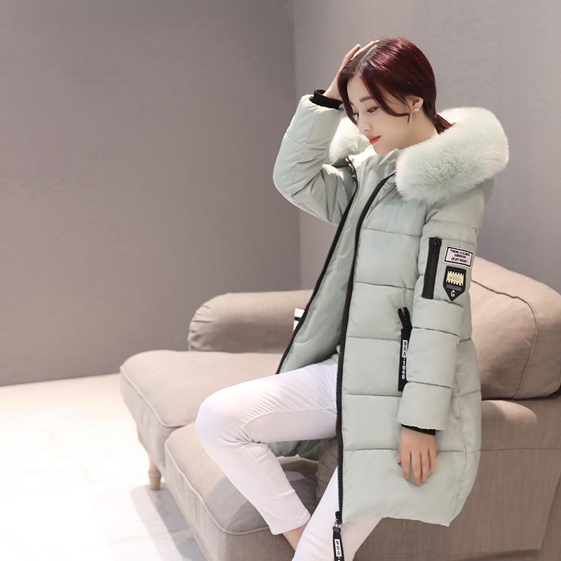Winter Neu Koreanische Version Mode Mittel und Lang Baumwollgepolsterte Kleidung Damen Große Größe Schlank geschnittene Kapuzenjacke Damen Baumwollgepolsterte Jacke