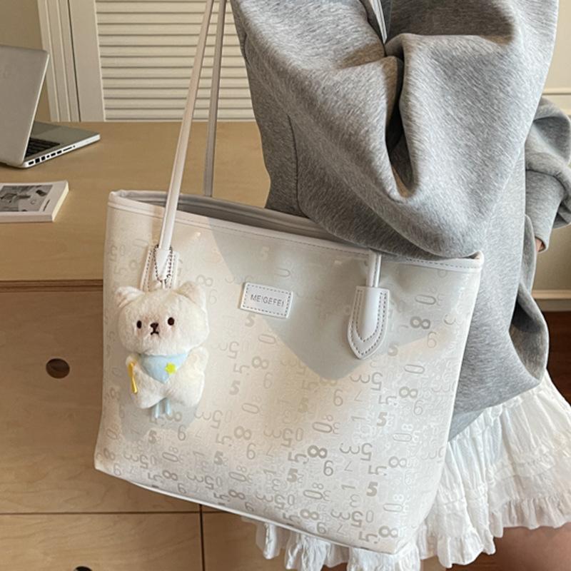 Large capacity bag women's summer new simple portable shoulder bag commuter tote bag