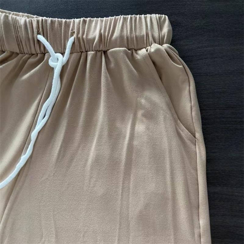 Women's solid color casual elastic waist lace-up trousers