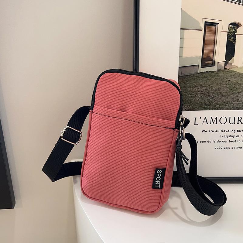 Multi-color mobile phone bag, large-capacity shoulder bag, simple and fashionable messenger bag, solid color change bag, nylon small backpack.