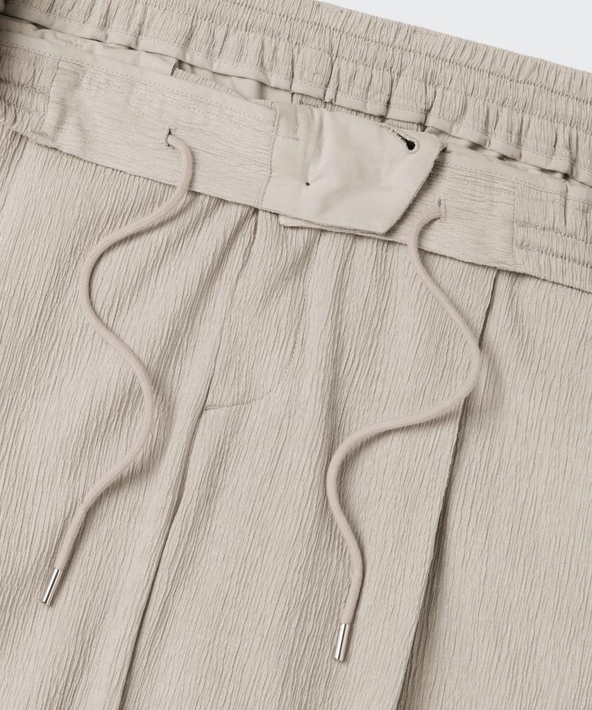 Musinsa Standard Crinkle Loose Tapered Elastic Waist Pants [Light Beige]