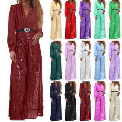 Damesmode: Blouse met V-hals en lange mouwen, elegant en sierlijk, getailleerd voor een flatterend silhouet, jumpsuit met wijde pijpen en pailletten.