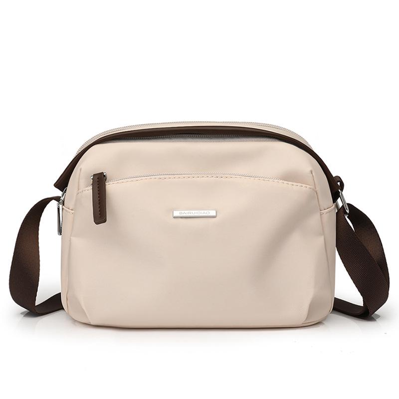 

Модна нейлонова сумка через плече з багатьма кишенями для жінок One Size