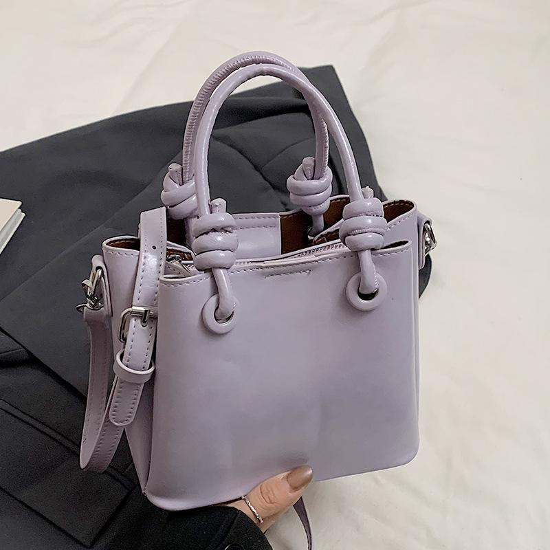 

Trendy new products niche simplicity high sense Korean version sweet portable bucket bag versatile commuter foreign style messenger women s bag