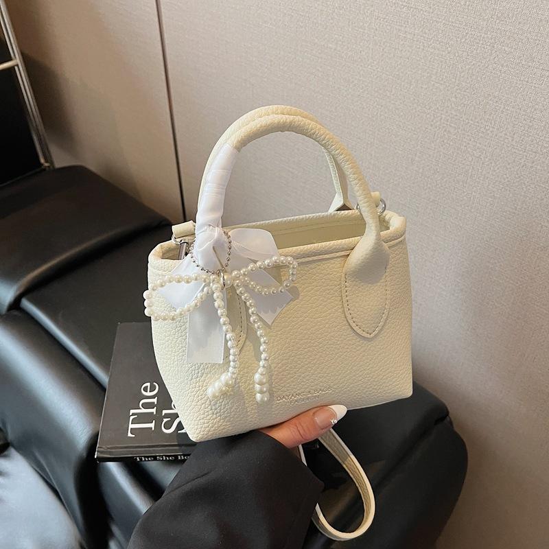 2025 nová mašle perlová kabelka dámská móda ležérní svěží jednoduchá ramenní crossbody niche design taška