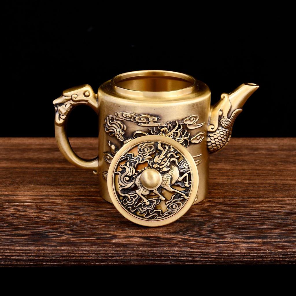 Brass Rotating Qilin Teapot: Creative Light Luxury Copper Handicraft Ornament for Home or Office.