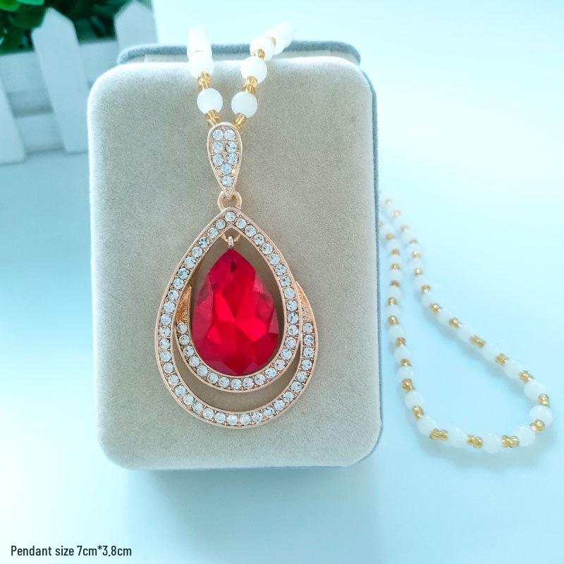 Damen Lange Blumen-Anhänger-Halskette - Elegante Wassertropfen-Pulloverkette für Herbst/Winter