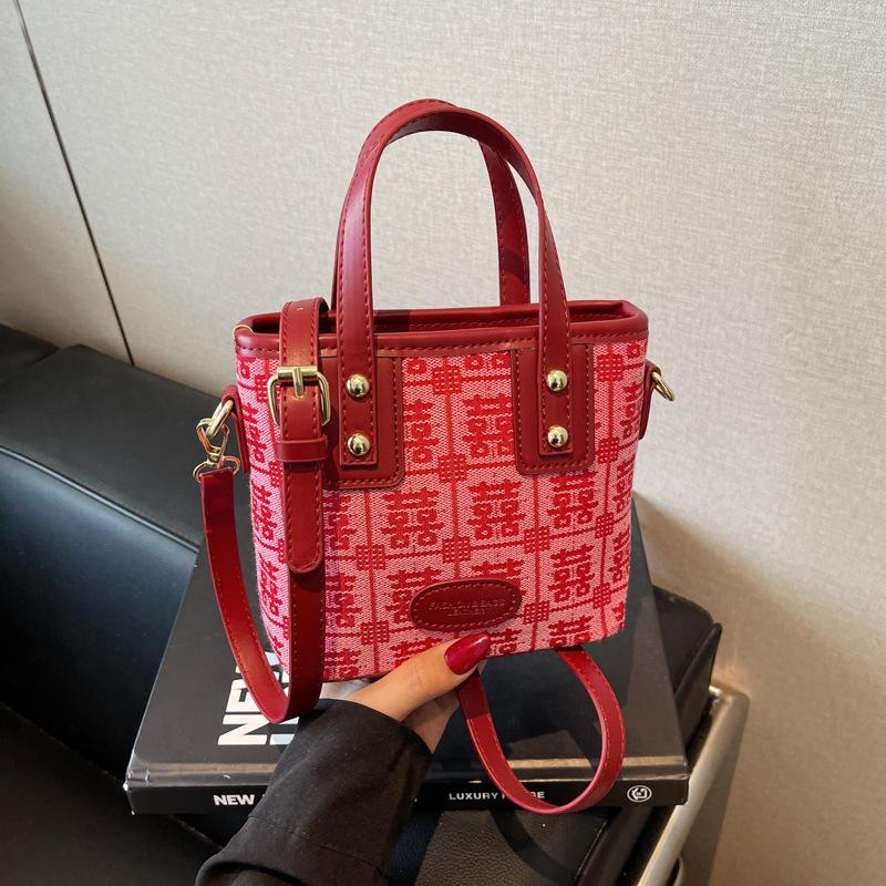 Bag women's spring and summer new contrasting color bucket bag casual red handbag embroidered women's bag wedding bag