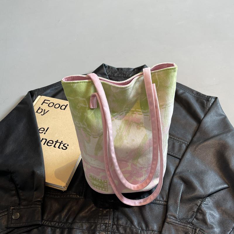 

Summer casual canvas bag women s 2025 new smudged flower bucket bag fashion shoulder armpit bag розовый