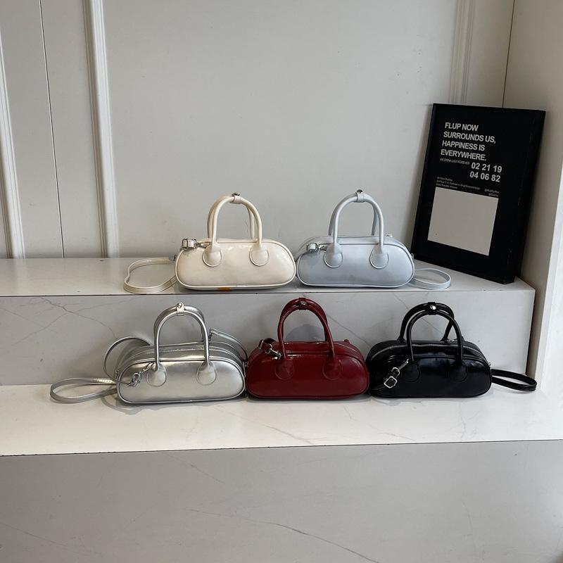 New niche high-end sense simple solid color personality versatile fashion portable messenger women's bag