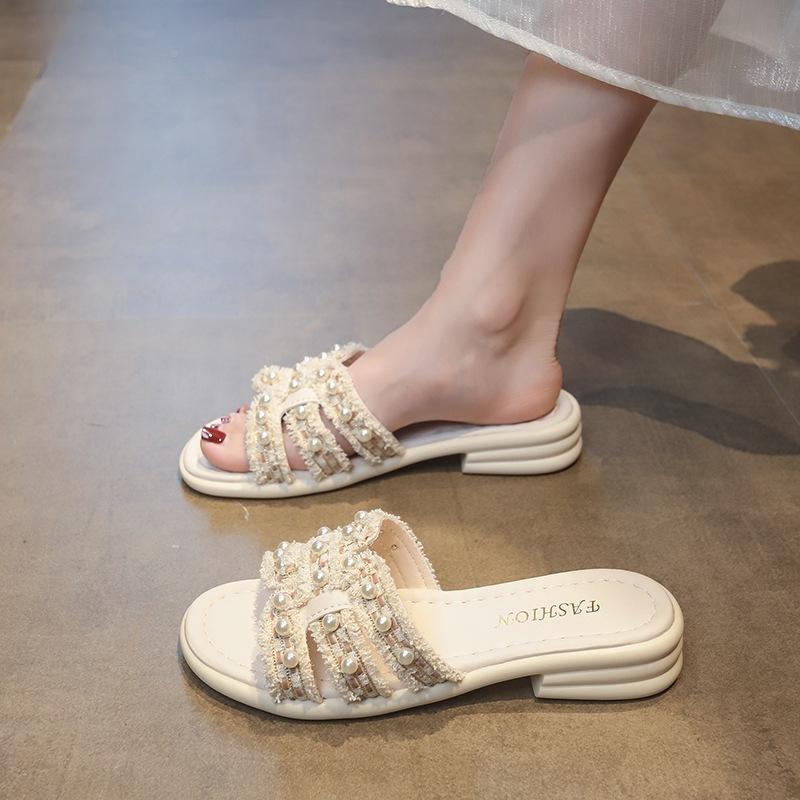 

Французские шлепанцы-жемчужины на плоской подошве для женской летней носки 2025 новый Xiaoxiangfeng модные дышащие пляжные крутые шлепанцы на мягкой подошве 40
