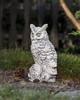 Garden sculpture of concrete owl figurine