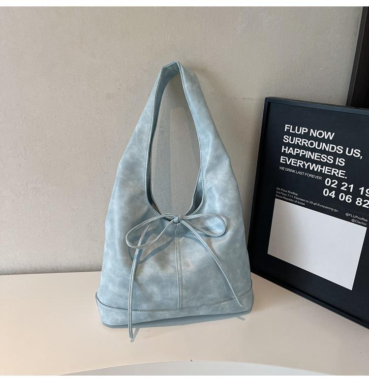 

Корейская сумка-бант высокого класса женская 2025 весна и лето нишевый дизайн новая сумка-тоут для поездок на работу на плечо синий