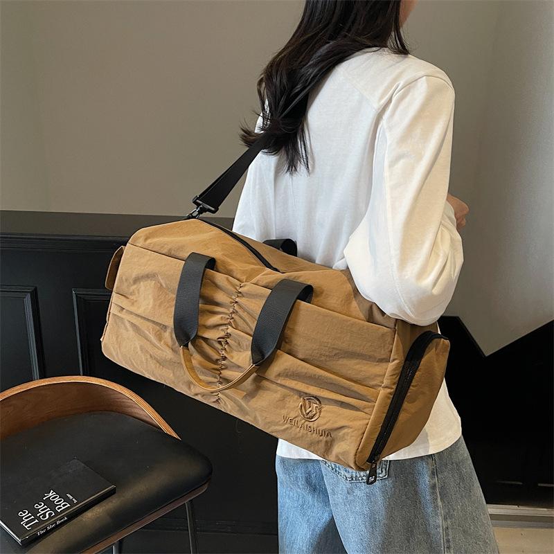 Large-capacity travel bag, new model with dry and wet separation, pleated storage bag, independent shoe compartment, travel sports and fitness bag