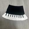 White Women Black Spliced Spring Short Skirt 2025 Y2k Slim Design Harajuku Mini Skirt Female Empire Korea Style Chic Piano Skirt
