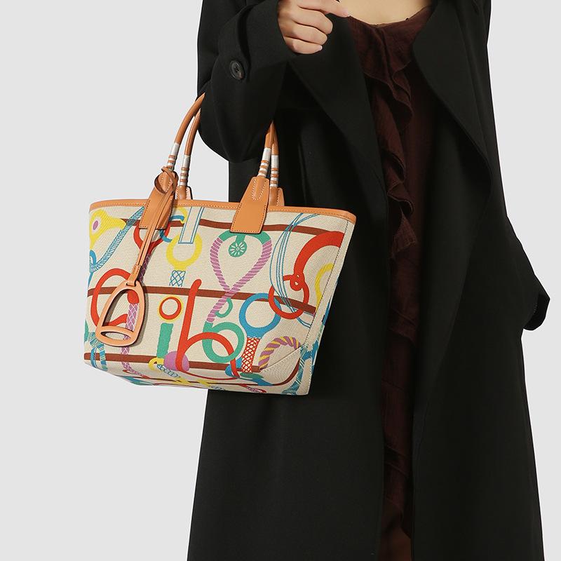 2025 New High-End Fashion Canvas Handbag for Women, Single-Shoulder Large-Capacity Patchwork Leather Versatile Commuting Tote Bag