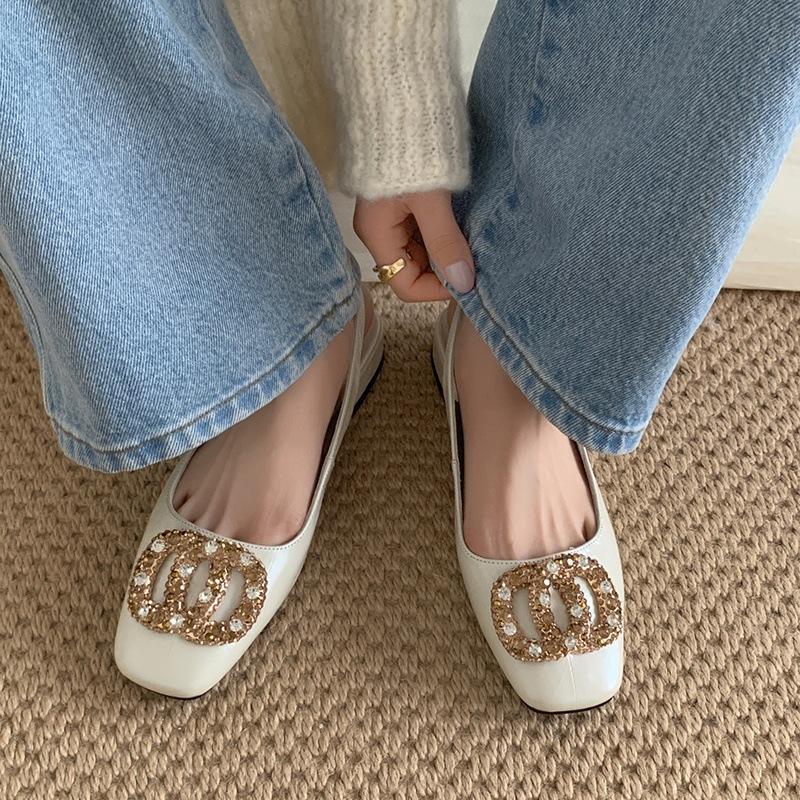 Leather shallow mouth low heel rhinestone sandals women's spring 2025 new bag head back empty word with sandals