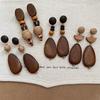 Silver Needle Retro Oval Wooden Stud Earrings: Elegant Ethnic Style with a Luxurious Feel for Women