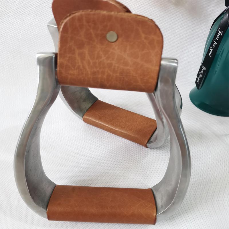 

Carved Aluminum Western Stirrups with Cowhide Covers - Equestrian Saddle Accessories Default