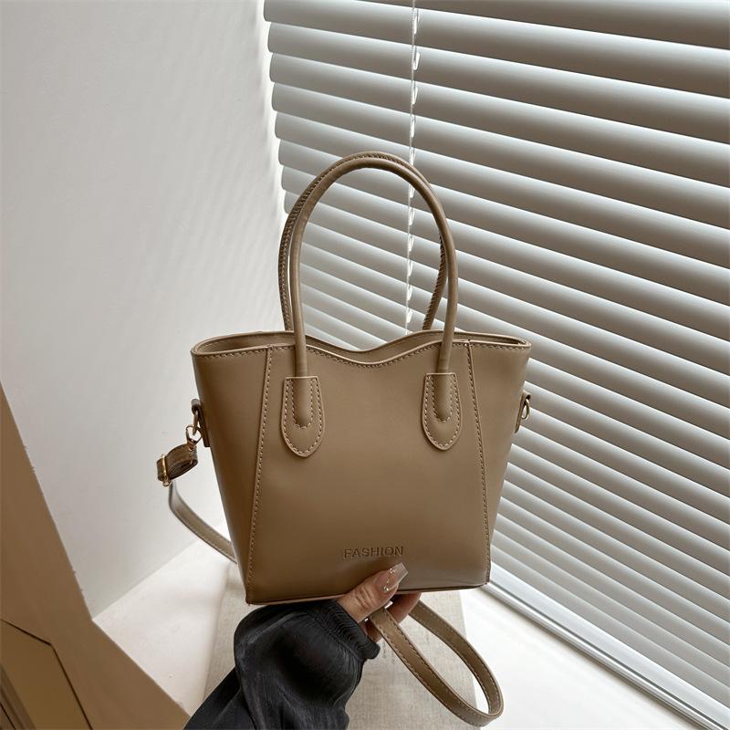 Contrasting color handbag bag women's summer new simple casual shoulder bag popular bucket bag