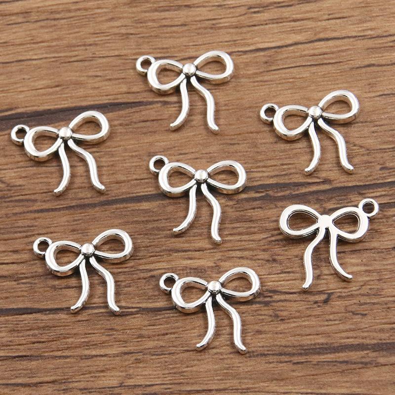 

10pcs DIY Alloy Jewelry Small Accessories Hollow Cute Bow Pendant 15*17mm