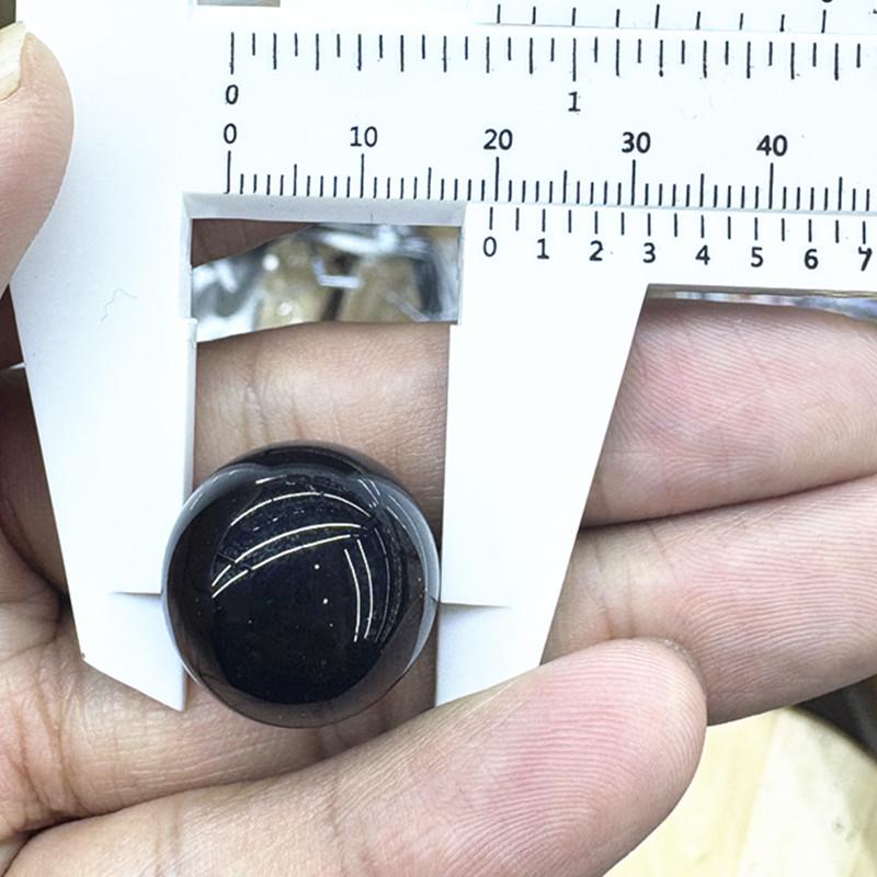 

Black Stone Round Glass Ball Sculpture with Inlaid Eyes - No-Hole Design for Display and Decoration Black No-Hole Round Ball