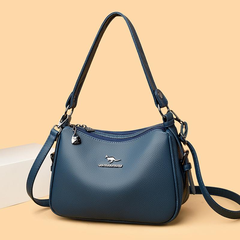 

Dumpling-Shaped Soft Leather Cross-Body Handbag - Fashionable & Versatile for All Seasons, Ideal for Middle-Aged Women синий