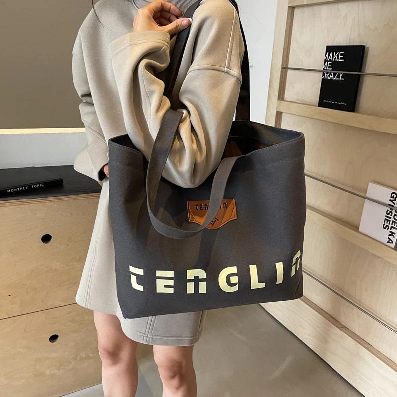 Women's shoulder bag printed letter large capacity monochromatic stitching line casual bag