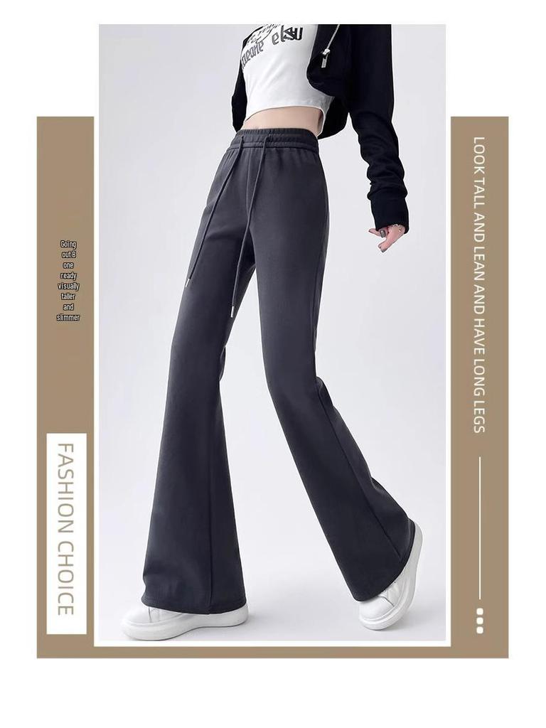 Damskie spodnie dresowe wyszczuplające z wysokim stanem, ze ściągaczem, mikro rozszerzane - Casualowe, podnoszące biodra, fason petite, wiosenny design