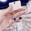 Boucles d'oreilles élégantes en cristal bleu Love pour femme – Design long et luxueux
