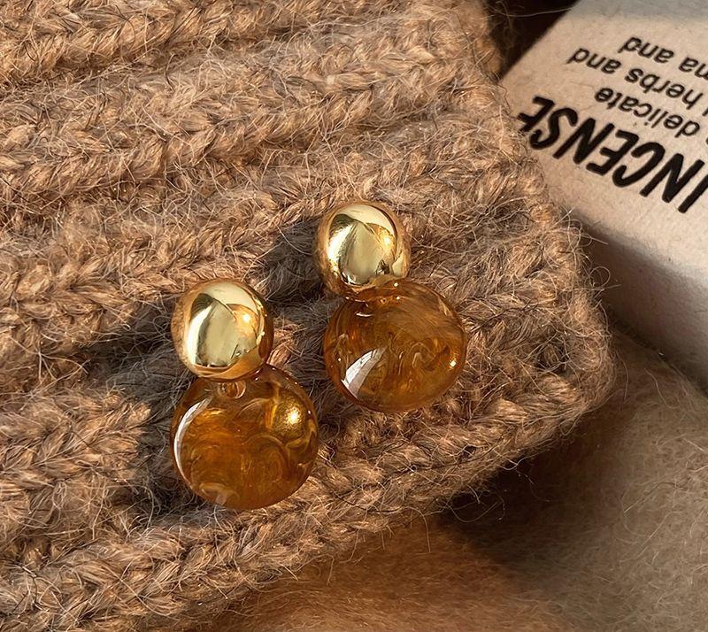 

Винтажные элегантные серьги из янтаря золотой