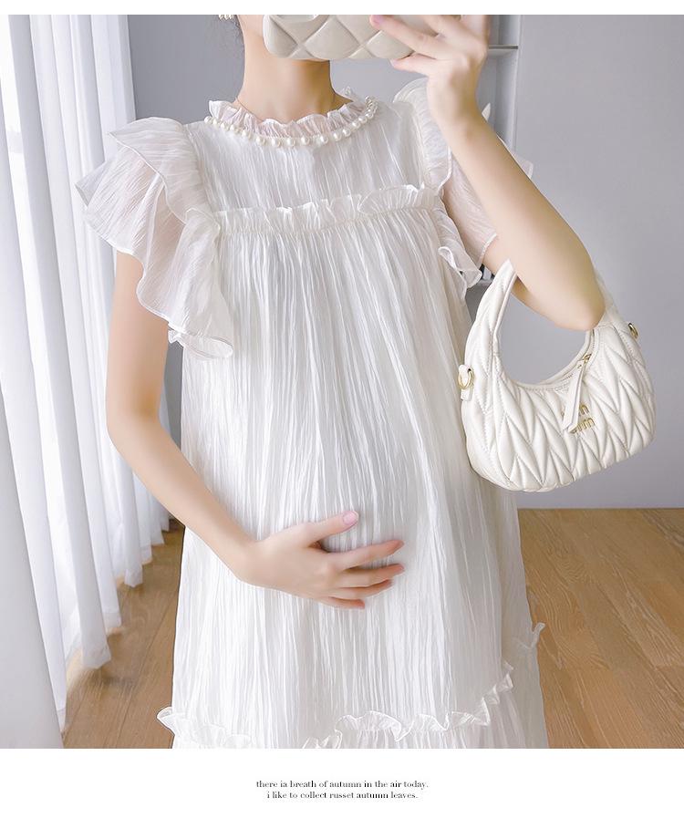 Dostępne teraz: Letnia sukienka ciążowa z falbankami na rękawach i perłowego tencelu, 2025