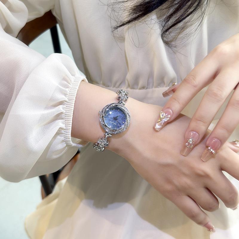 Light Luxury Diamond-encrusted Women's Watch Niche Design Fritillary Four-leaf Clover Bracelet Watch High-end Fashion Quartz Watch