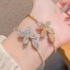 Niche four-leaf flower butterfly open zircon bracelet bracelet versatile hand jewelry women