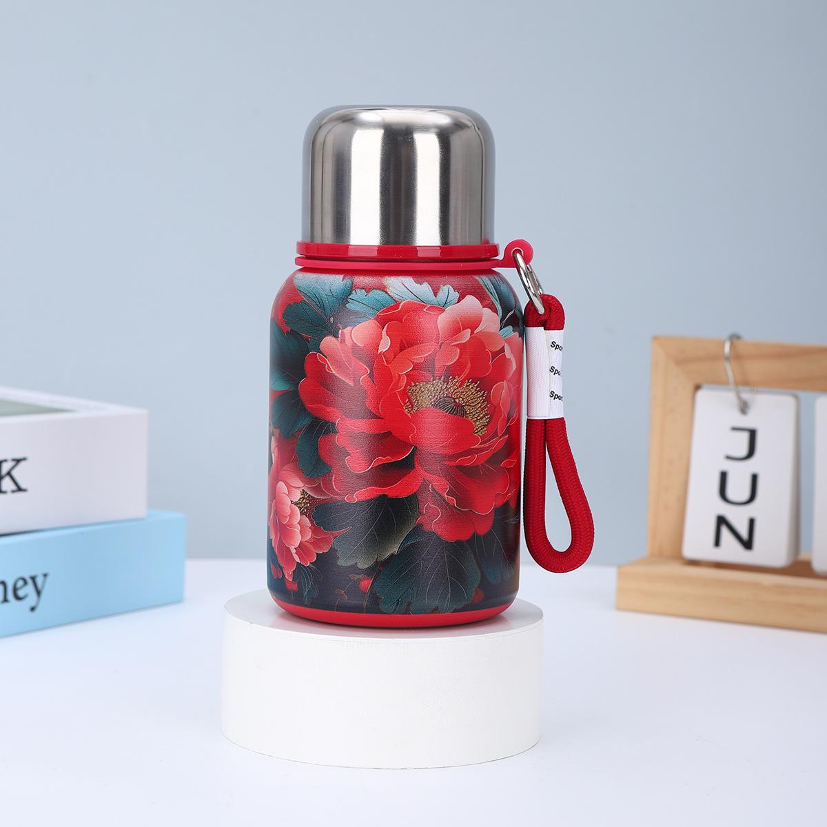 

Високий рівень зовнішнього вигляду Чашка-термос великої місткості з нержавіючої сталі з делікатним малюнком Портативна чашка для води з переносною чашкою 450ml